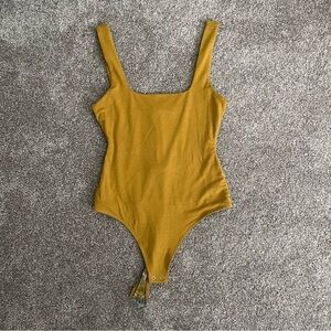 Good American Modern Squareneck Tank Bodysuit in Goldenrod